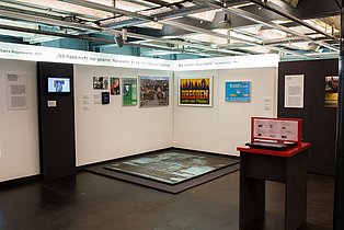 The photo shows a view of the exhibition; "Bombing War" section.